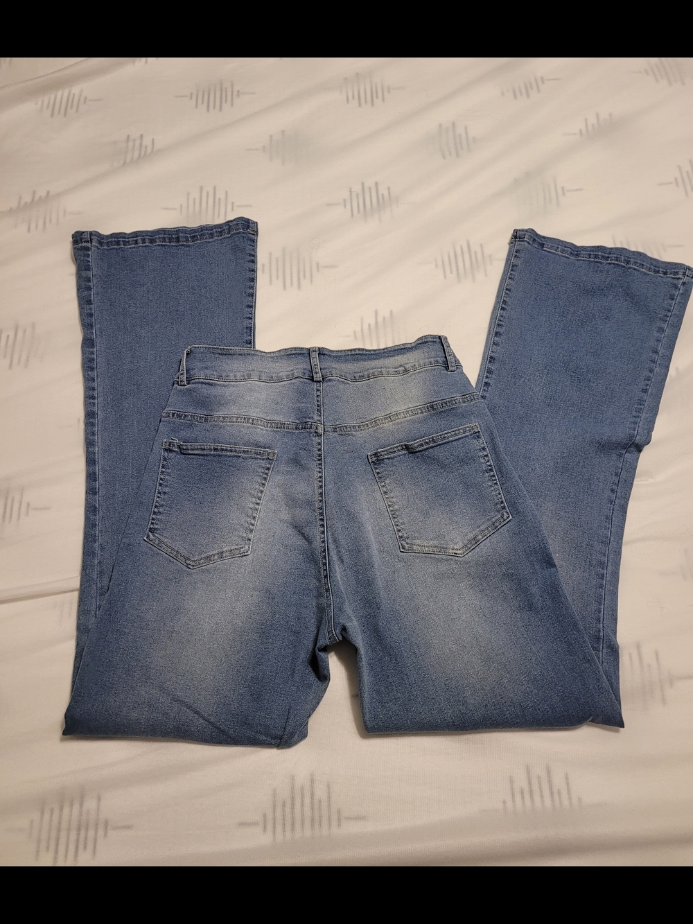 High-Rise Flare Jeans in Medium Blue - Women's - Picture 3 of 5